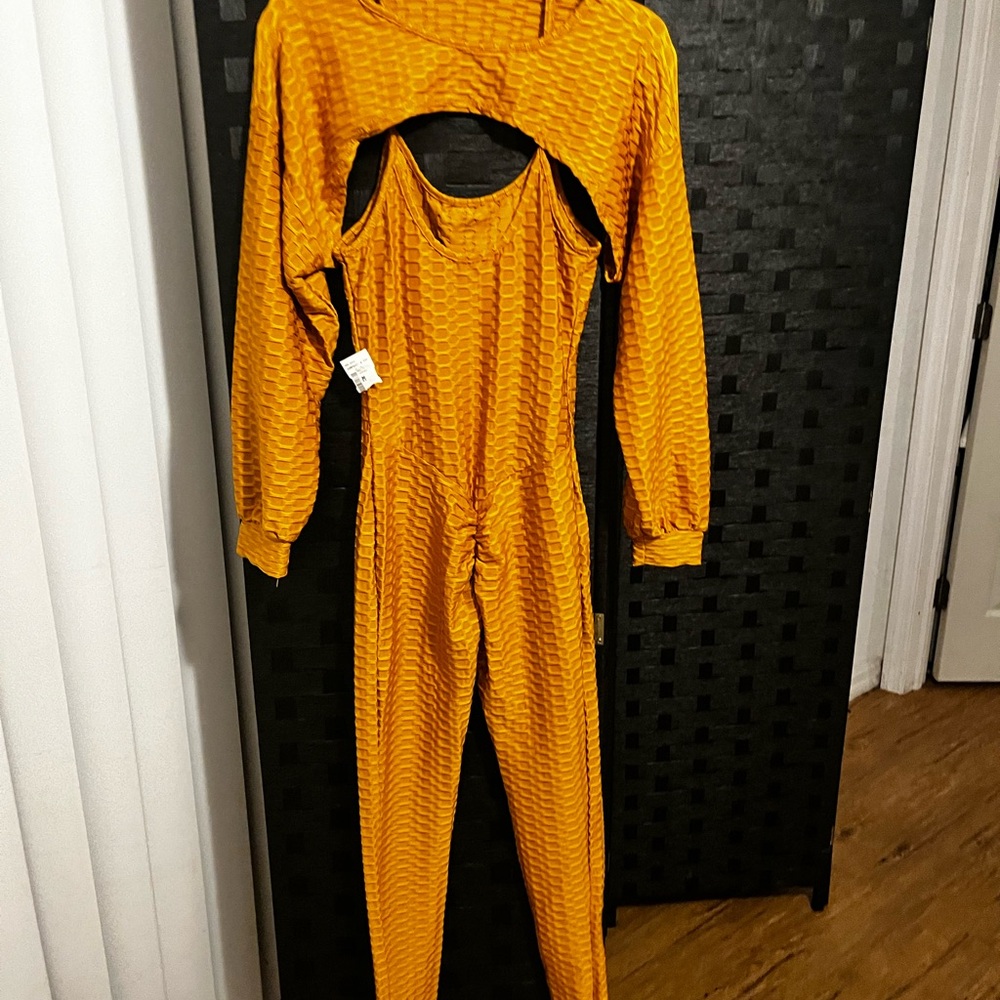 Vibrant Orange Jumpsuit with Cutout Design